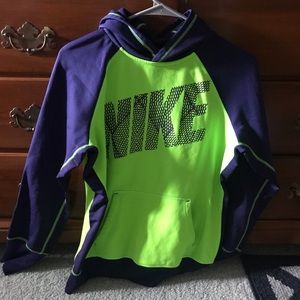 Neon Nike sweatshirt.